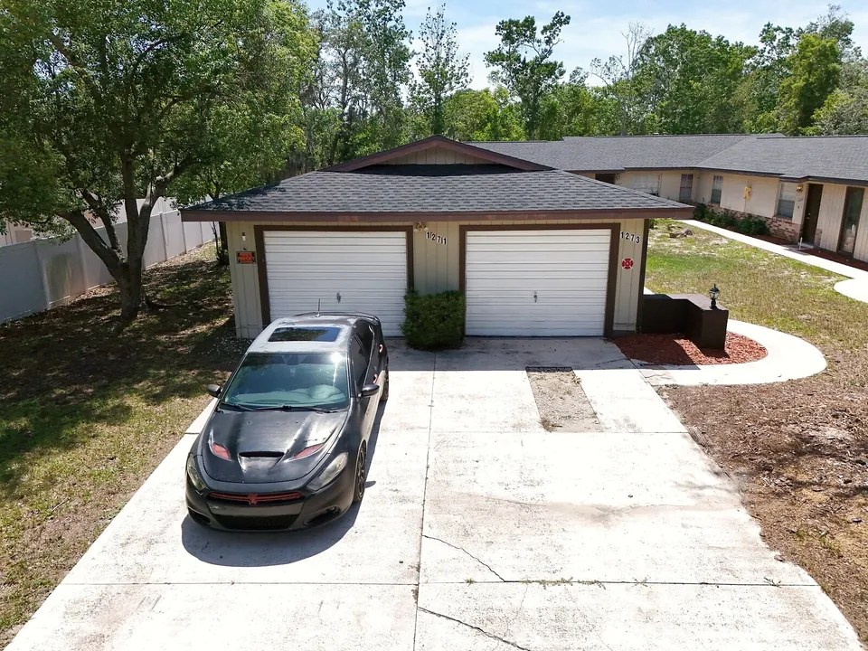 Exterior driveway garage detail at 1277 Sylvia Avenue
