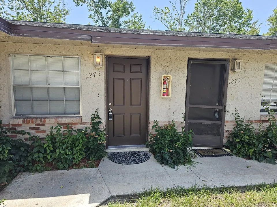 Exterior front entry 1273 at 1277 Sylvia Avenue