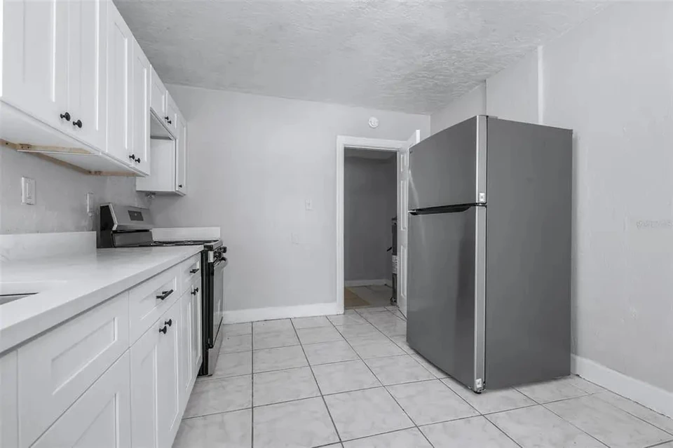 Kitchen with refrigerator and sink at 1311 Prescott Street S