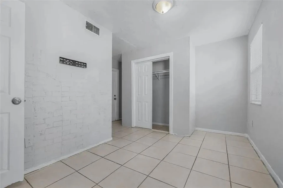Room with closet and adjoining doorway at 1311 Prescott Street S