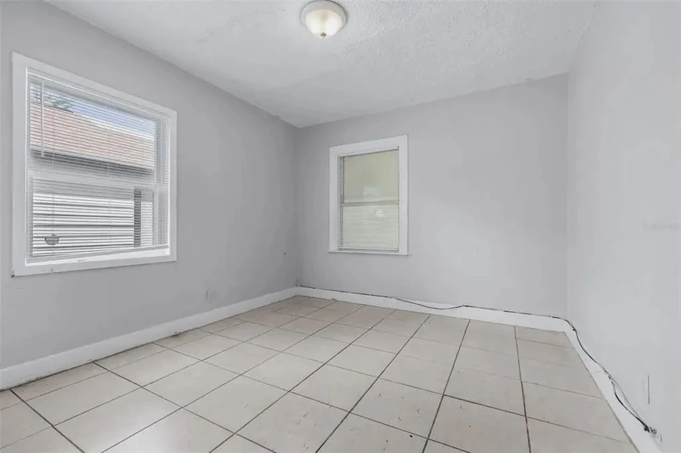 Bedroom with two windows at 1311 Prescott Street S