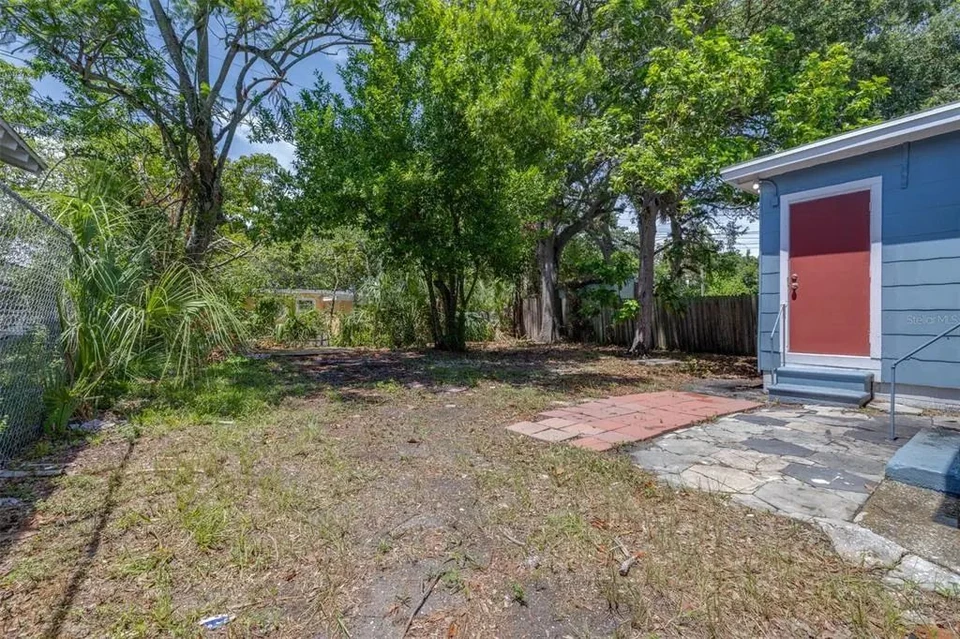 Side yard beside the home at 1311 Prescott Street S