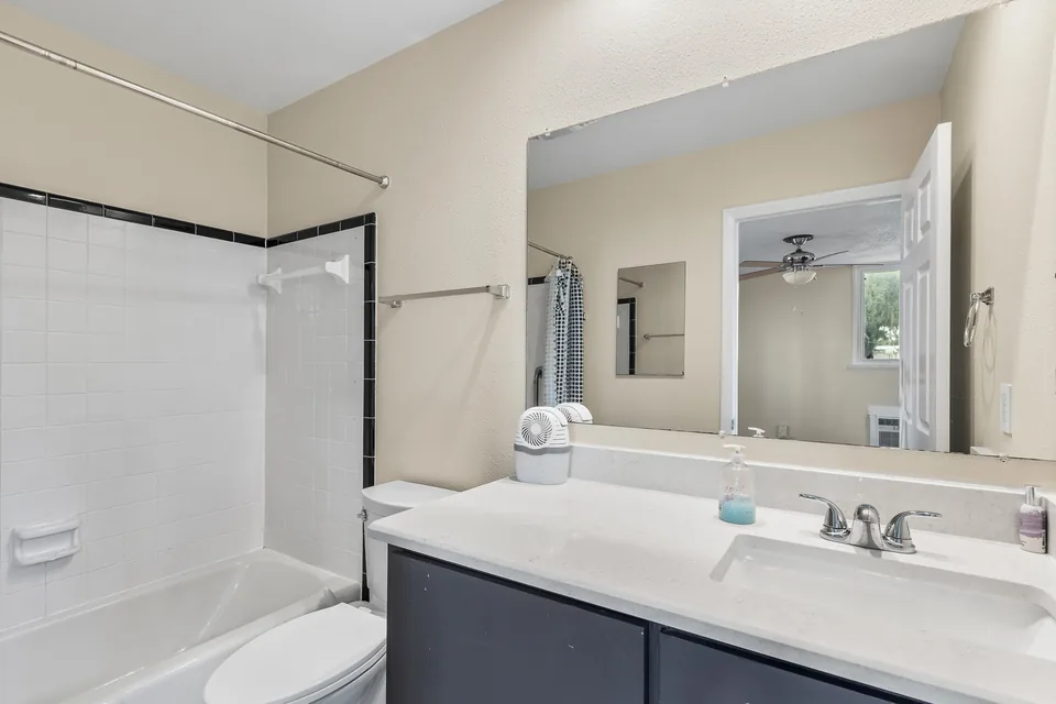 Full bathroom serving the detached bonus suite