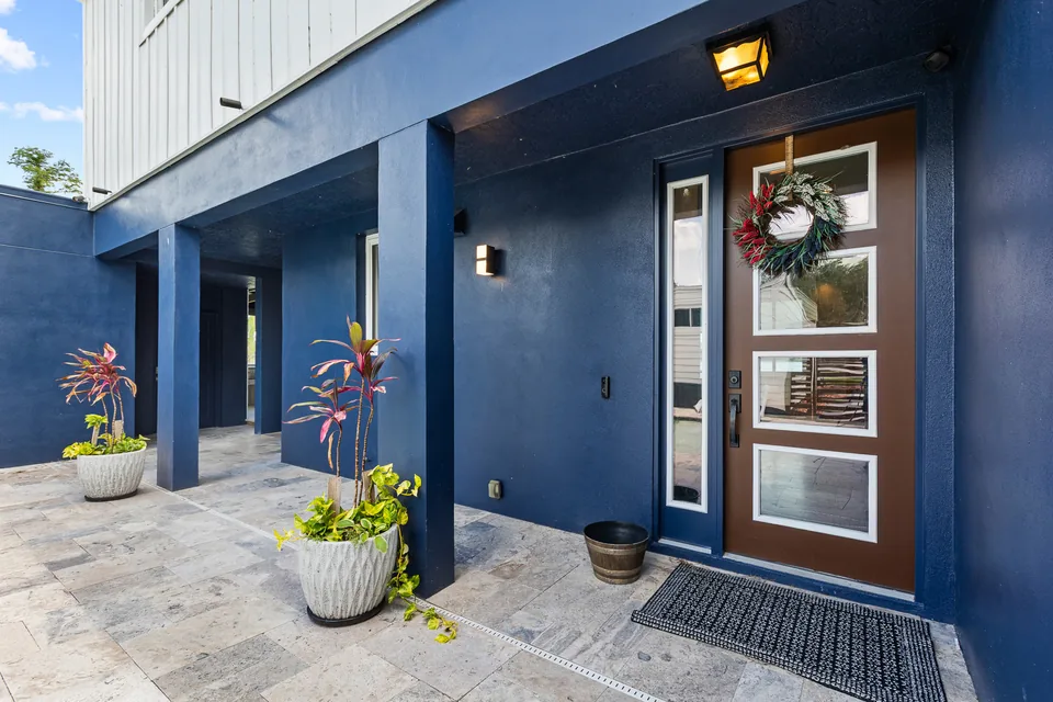 Covered front entry with double doors