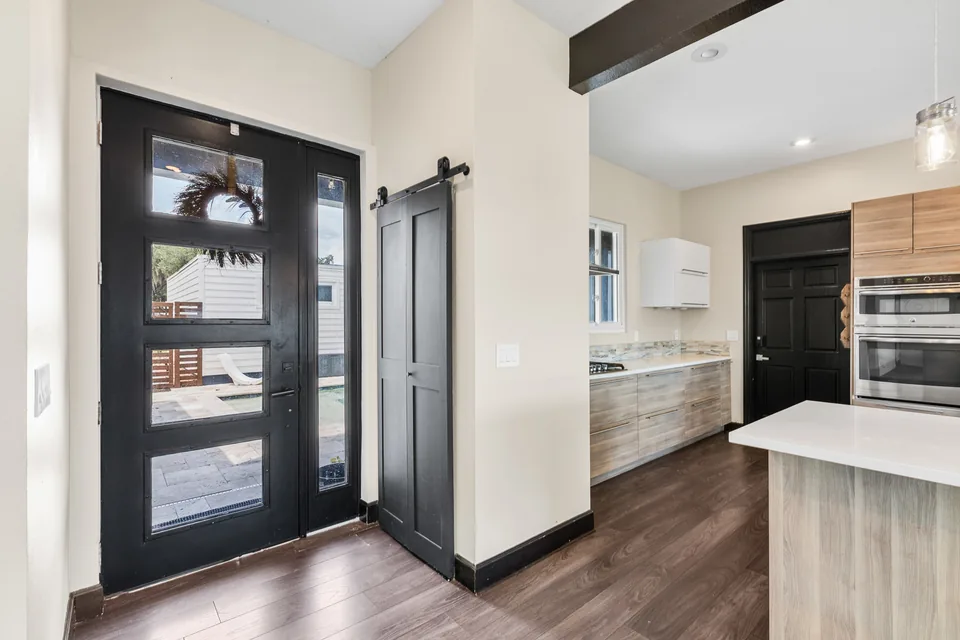 Interior foyer with tile floors and an open view toward the living areas