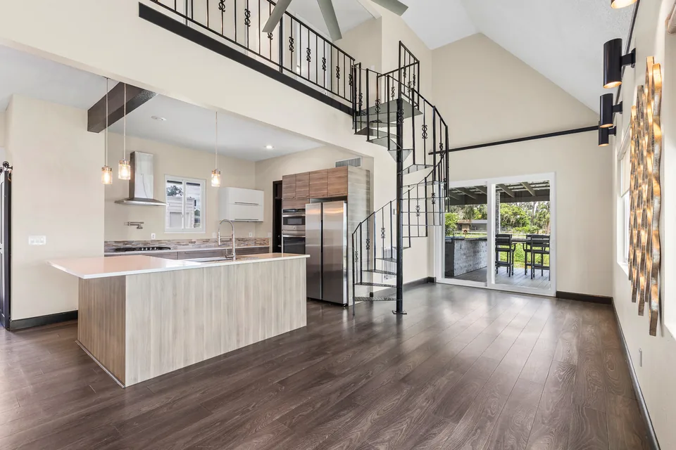 Open kitchen and living area with a central island