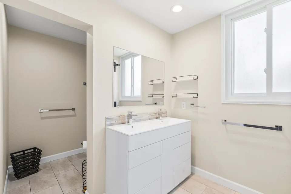 Primary bathroom vanity and storage