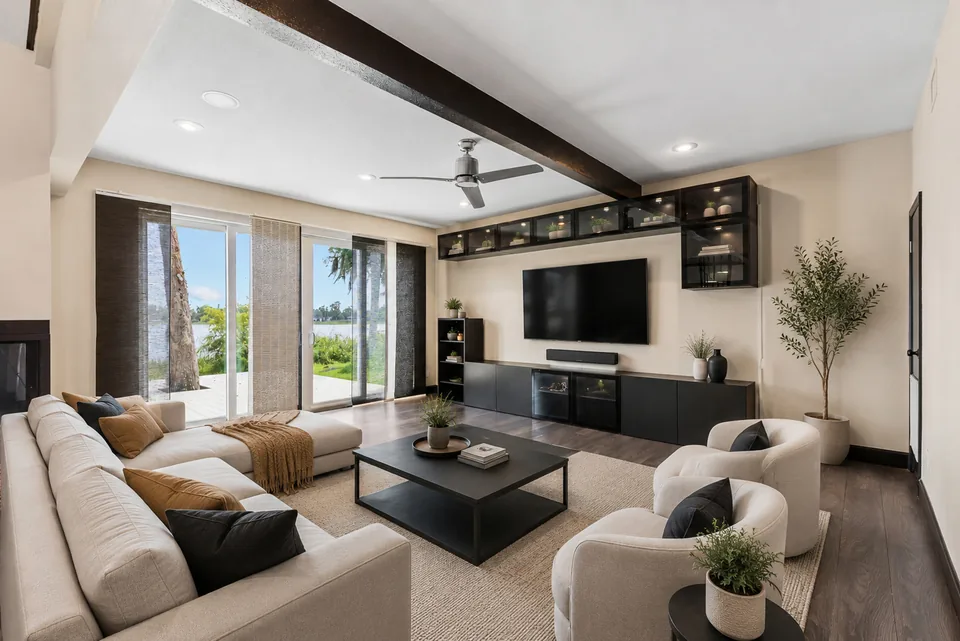 Virtually staged dining area with lake views