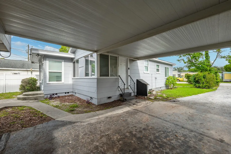 Covered carport between the residences
