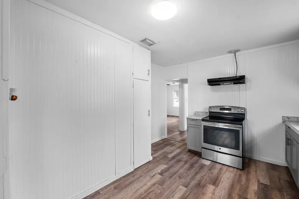 Kitchen range and adjacent hallway