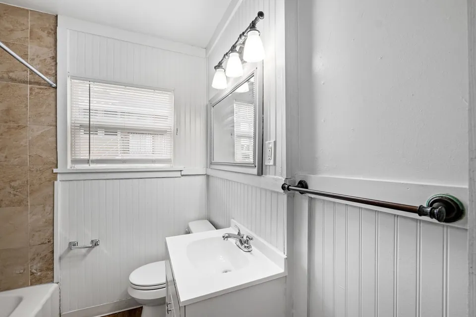 Bathroom vanity and toilet