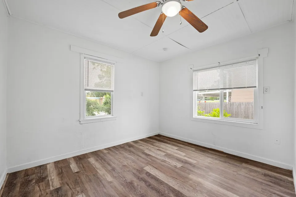 Bedroom with two windows