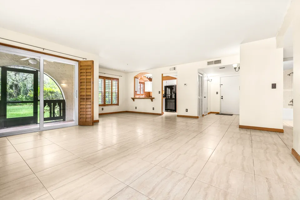 Open living, dining, and kitchen area