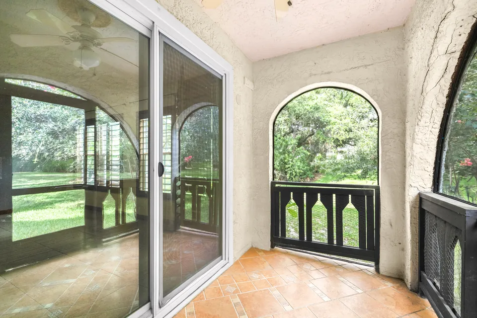 Screened patio overlooking greenery