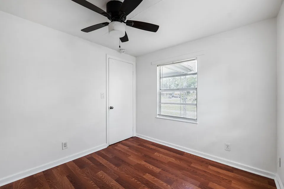 Bedroom with window and closet