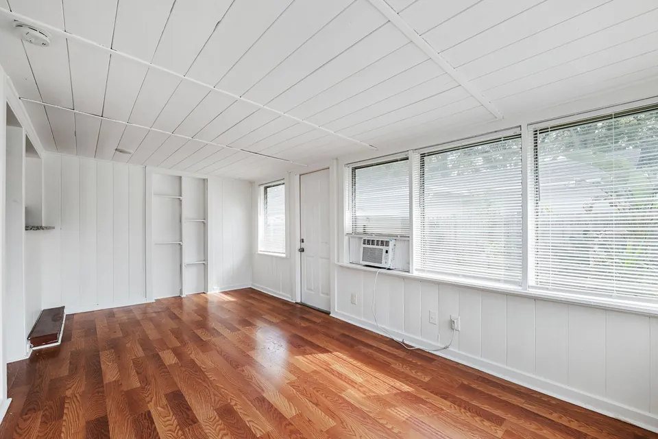 Enclosed porch with wall air conditioner
