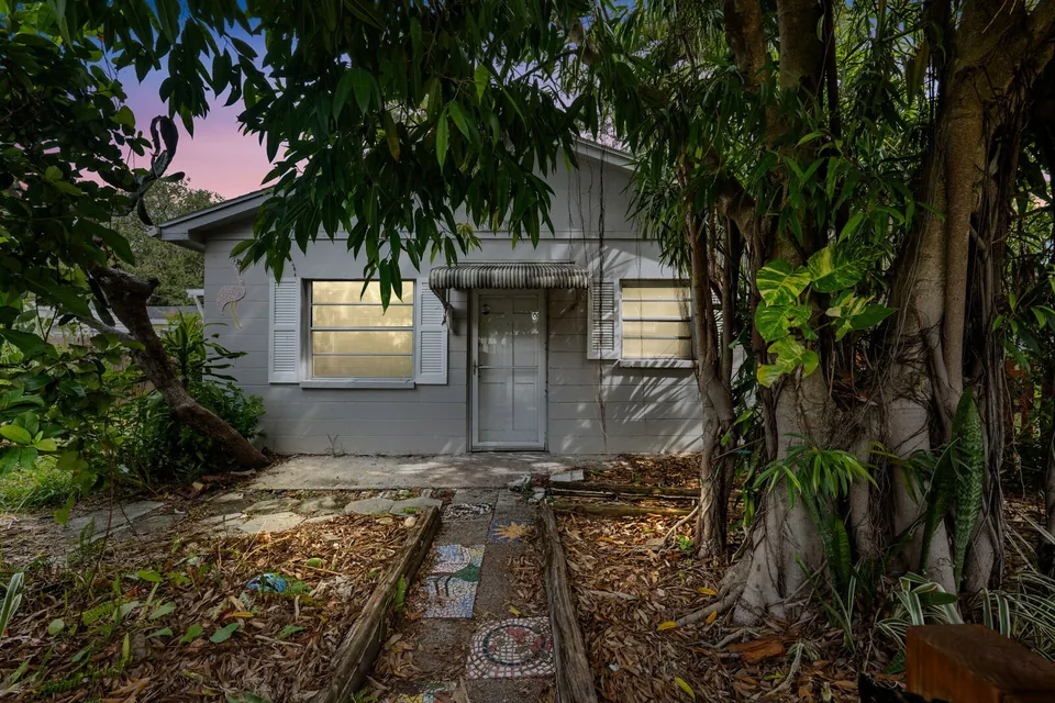 Rear residence beneath mature trees