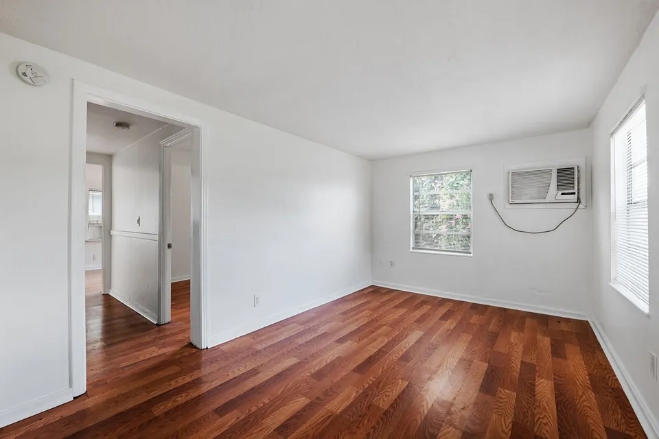 Bedroom with wall air conditioner