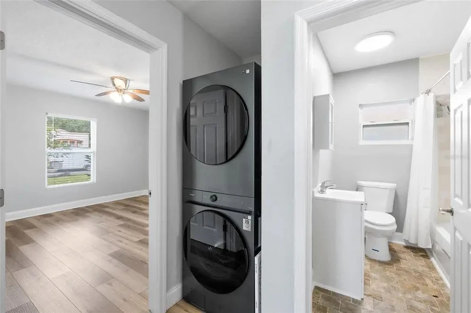 Laundry appliances beside the bathroom at 5907 N Ola Avenue