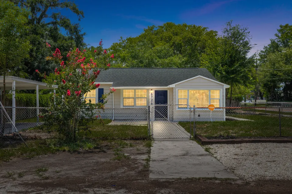 Front exterior at dusk at 6726 North 11th Street