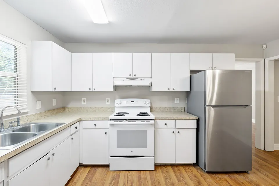 Kitchen with breakfast bar and stainless appliances
