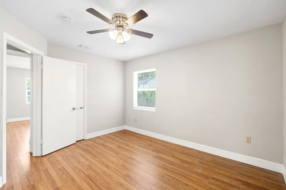 Bedroom with double closet doors
