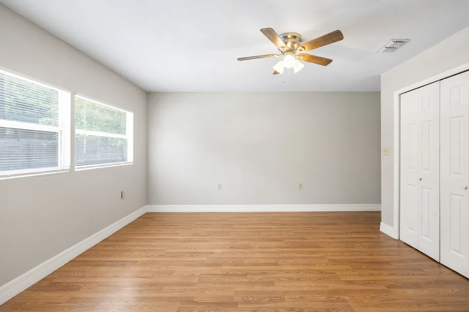 Large bedroom with two windows