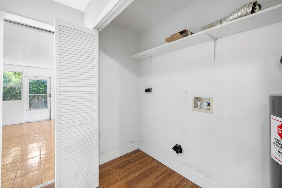 Laundry area with utility connections