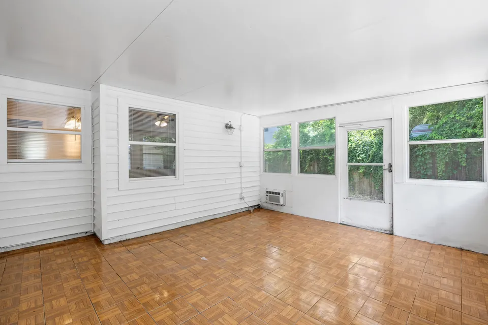 Enclosed rear room and exterior door