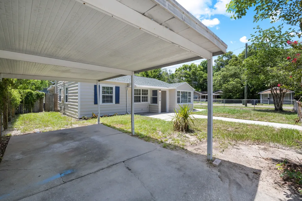 Covered carport and side entrance