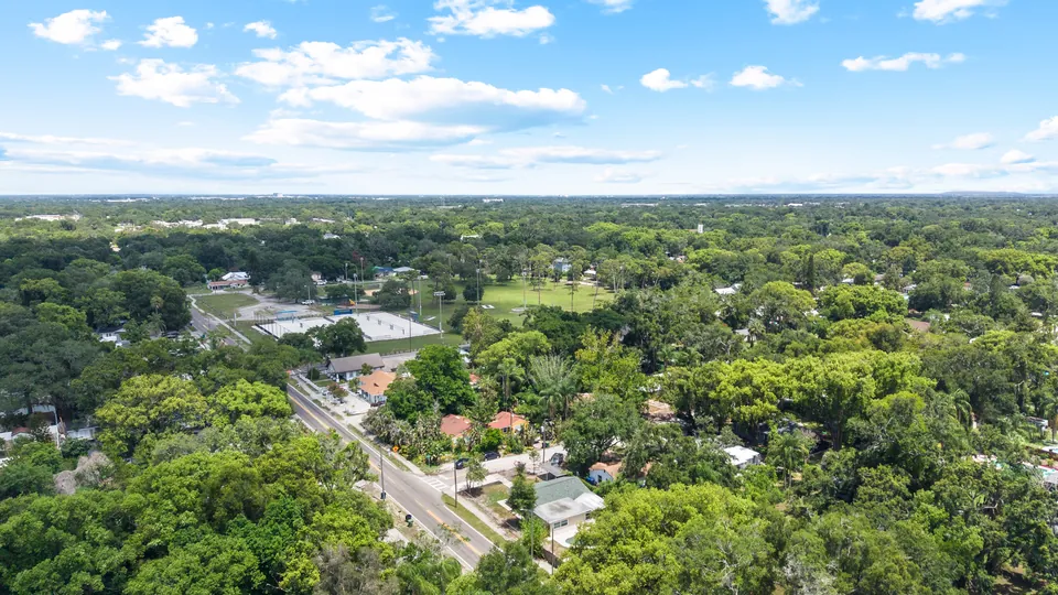 Aerial neighborhood view with property marker
