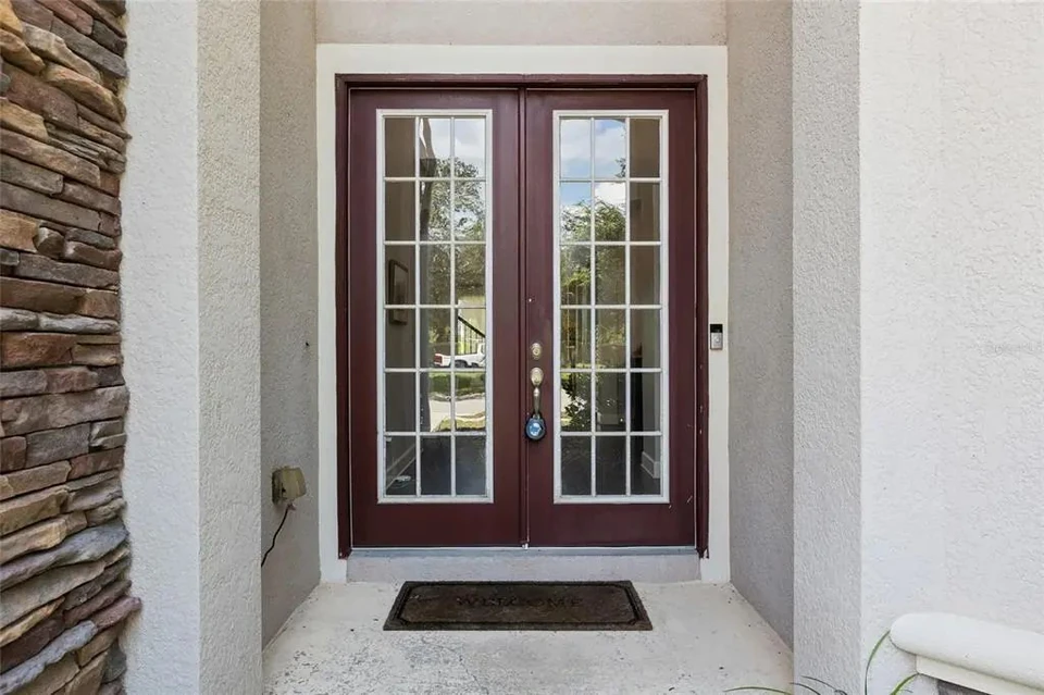 Covered front entry at 9113 Creedmoor Lane