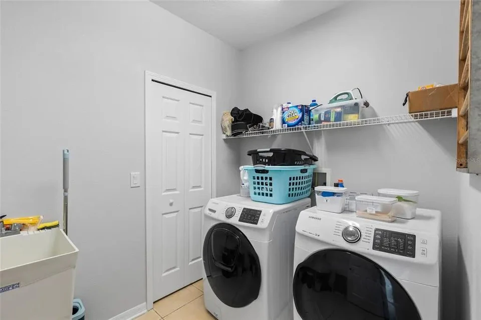 Laundry room with washer and dryer at 9113 Creedmoor Lane