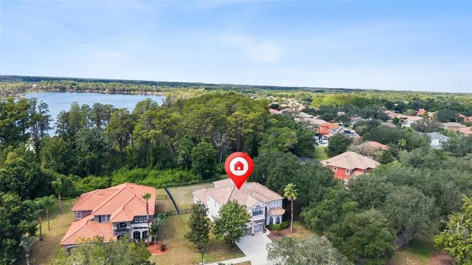 Aerial view of the home and surrounding neighborhood at 9113 Creedmoor Lane
